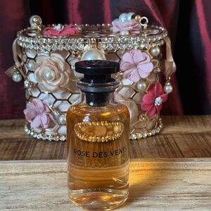 Louis Vuitton Rose Des Vents Perfume with Pink and Gold Accents